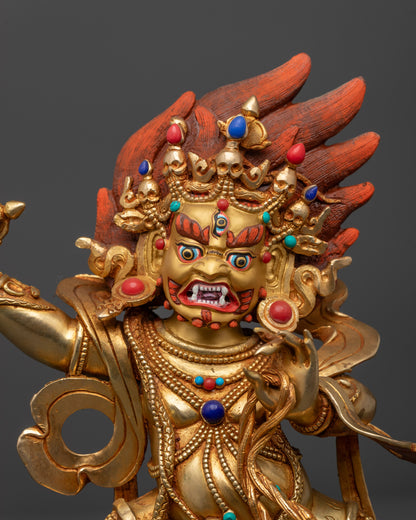 Close up Wrathful Vajrapani Statue showing fierce face, Vajra, Lasso, and Wrathflame halo
