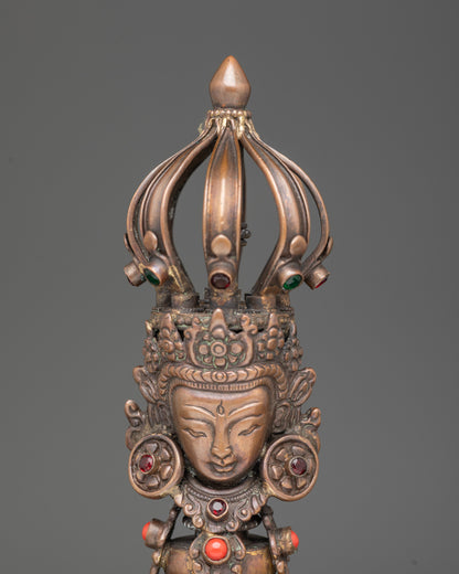 Close up bronze bell handle with five jeweled crown deity, oxidized copper Vajra for meditation
