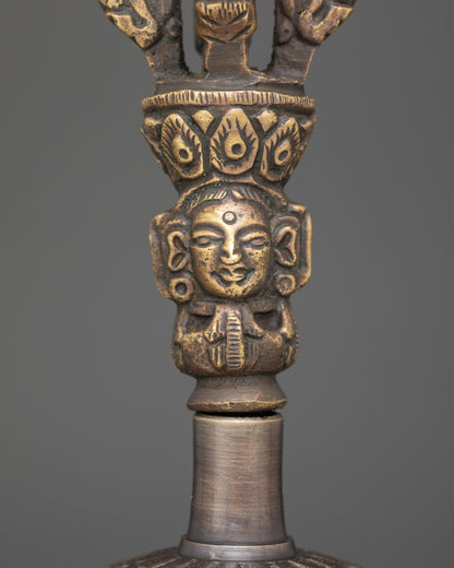 Close up bronze bell with brass deity handle from Himalayan Ghanta Dorje set