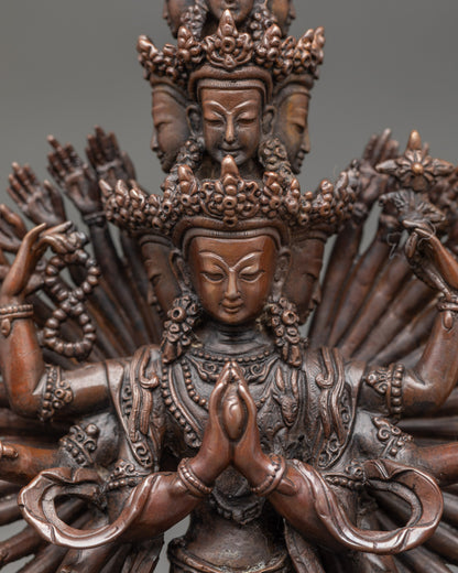 Close up detail Chenrezig statue thousand arms and eyes Himalayan Buddhist art