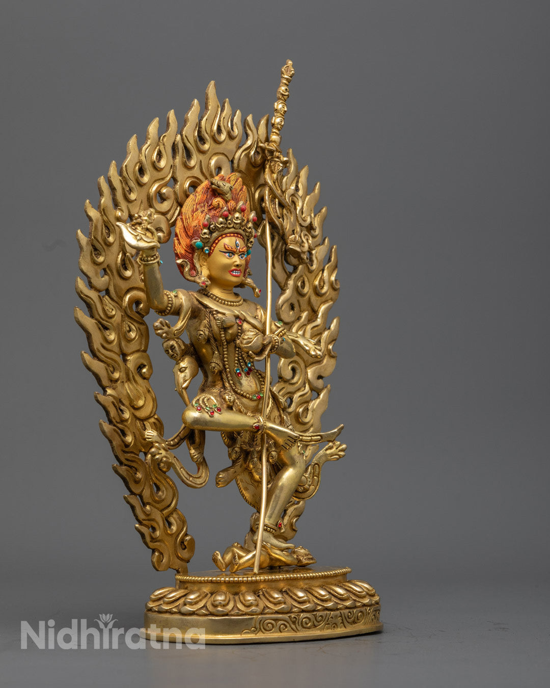 Close up detail of wrathful Troma Nagmo statue with skull garland and bone ornaments