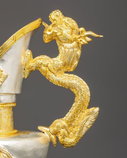 Close up dragon handle Bumba showing gold silver plated copper and detailed Himalayan craftsmanship