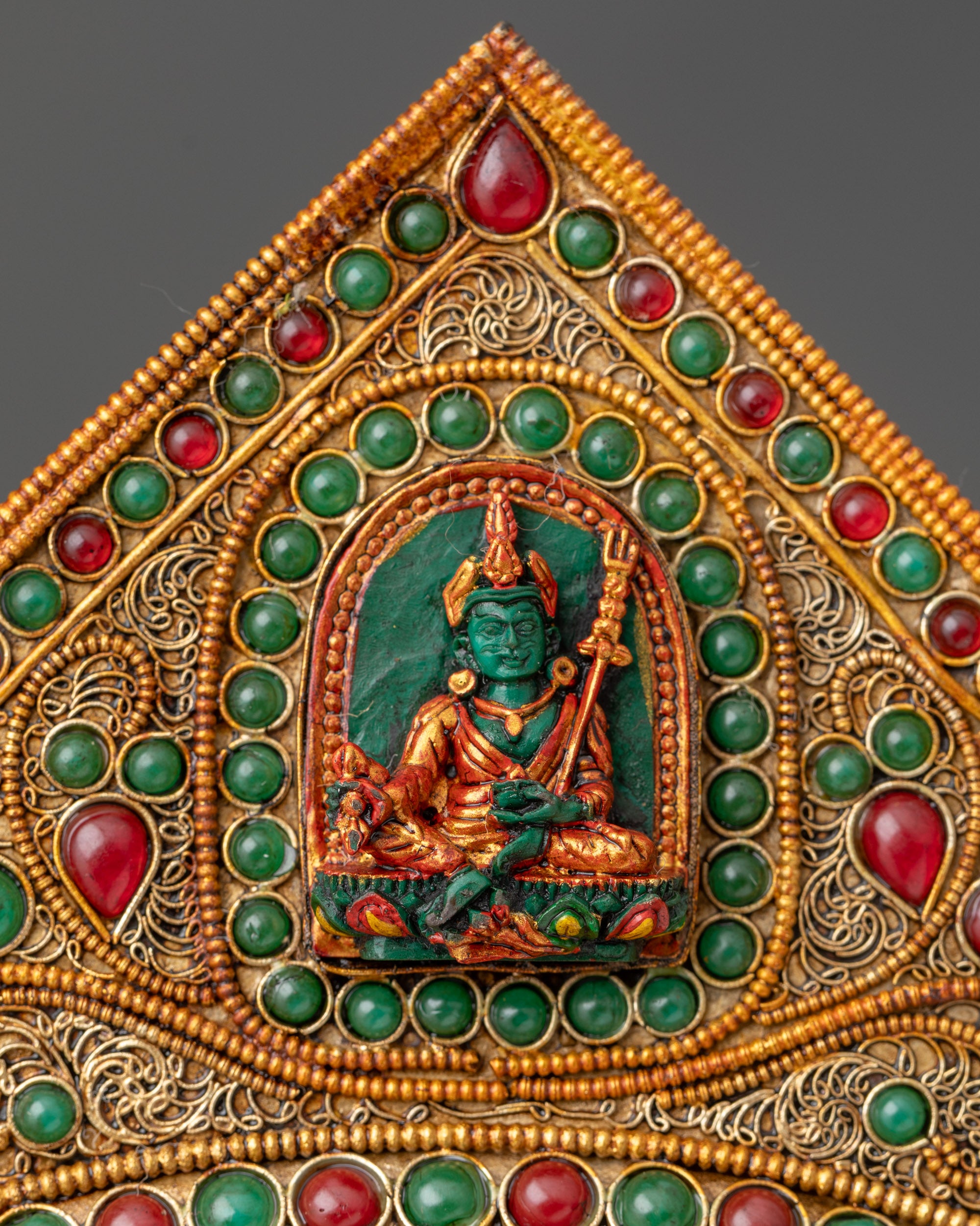 Close up filigree detail with hand-painted Guru Rinpoche