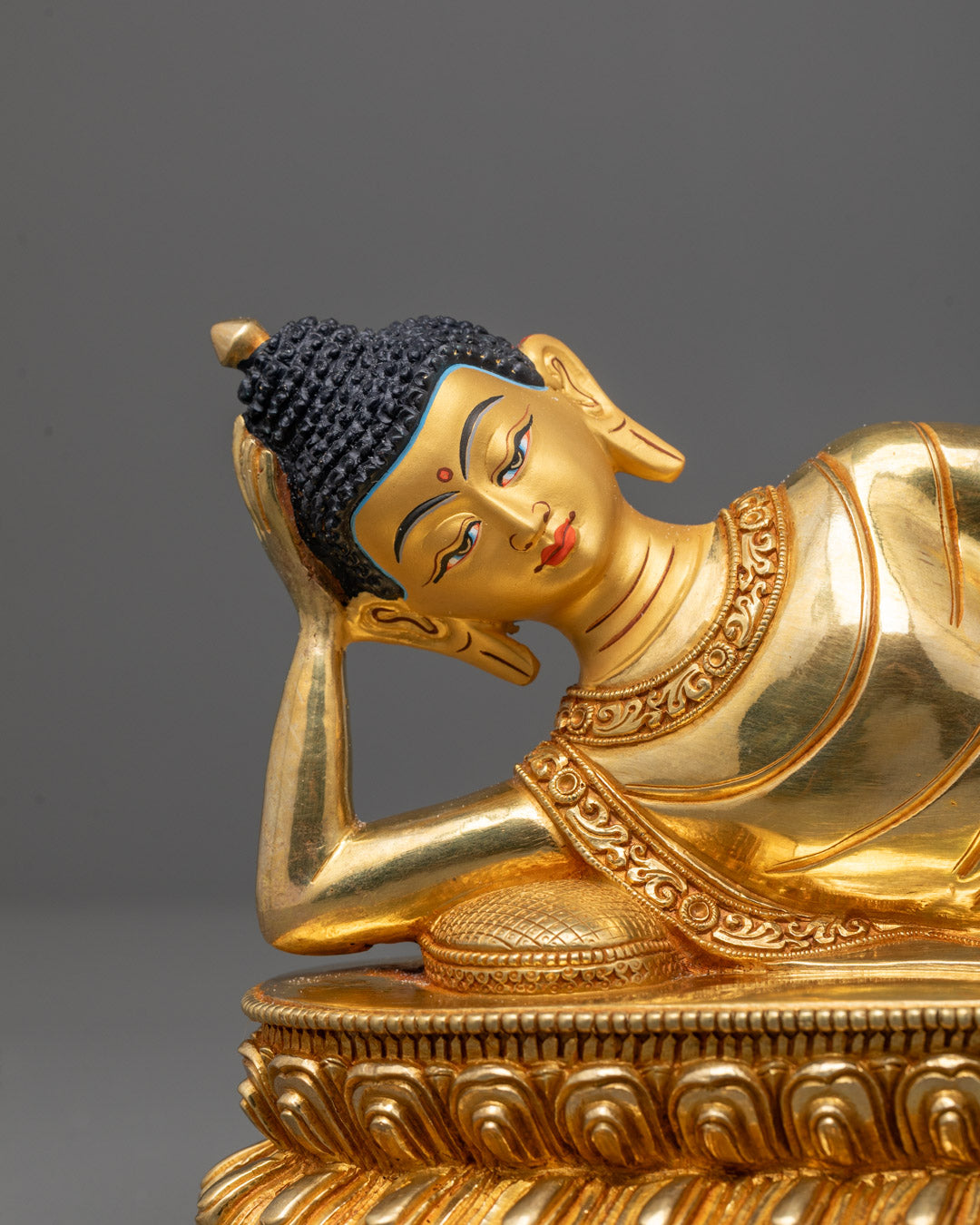 Close up image of Peaceful Sleeping Buddha Sculpture with Serene Expression