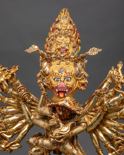 Close up nine-faced Yamantaka with wrathful expression and gold-painted face