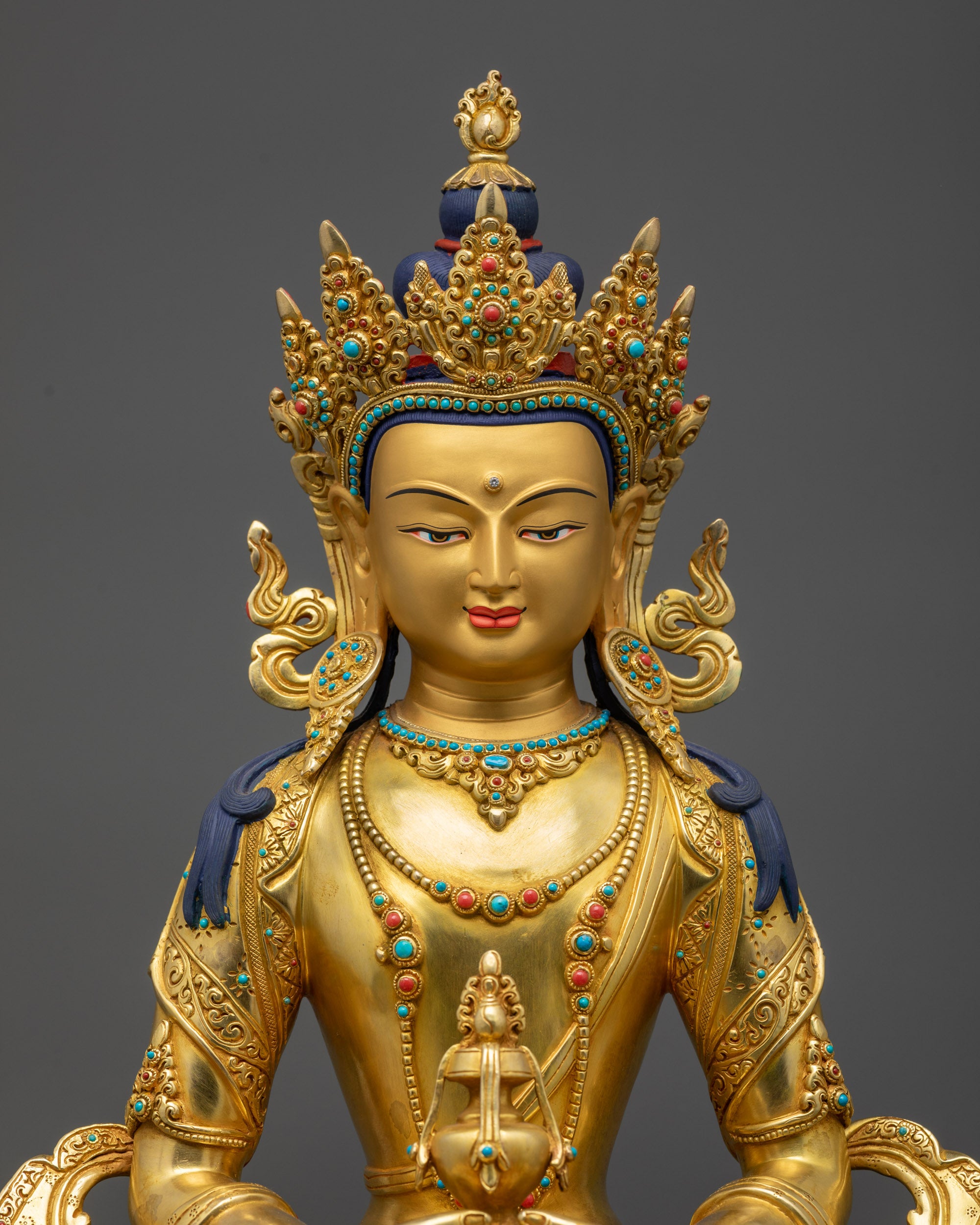 Close up of Amitayus Buddha holding vase of immortality on lotus pose
