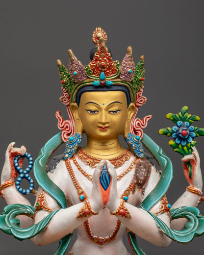 Close up of Avalokiteshvara statue showing crystal rosary, lotus, and wish-fulfilling gem
