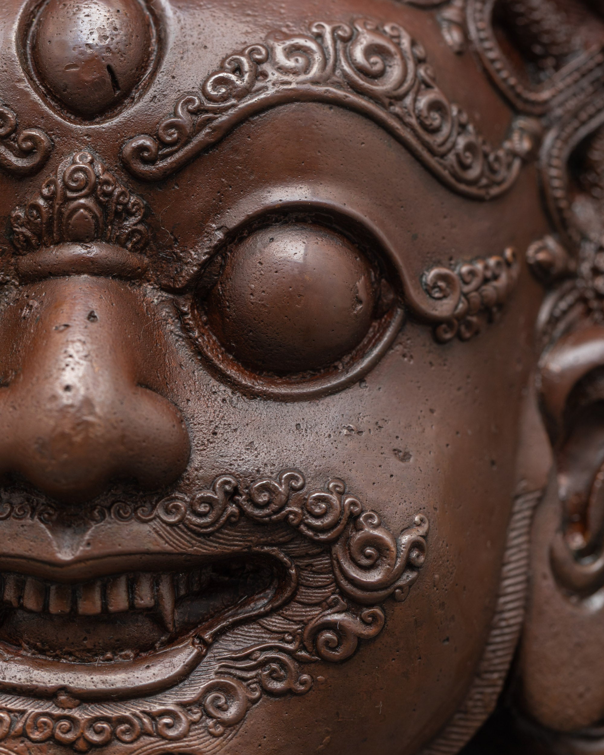 Close up of Bhairav Mask highlighting the crown, third eye, and intricate carvings