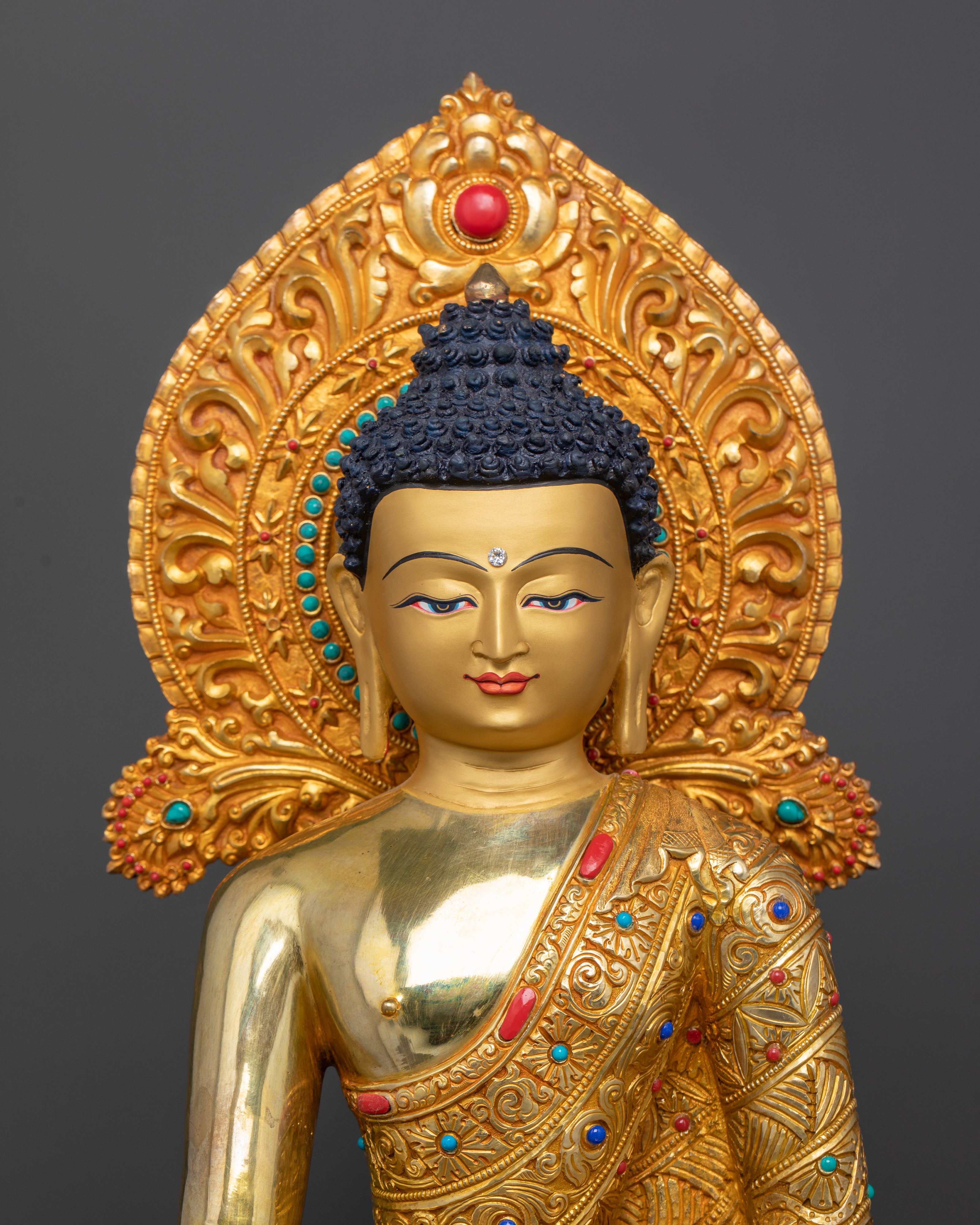 Close up of Buddha Shakyamuni's serene face, floral halo, semi-precious stones, meditation
