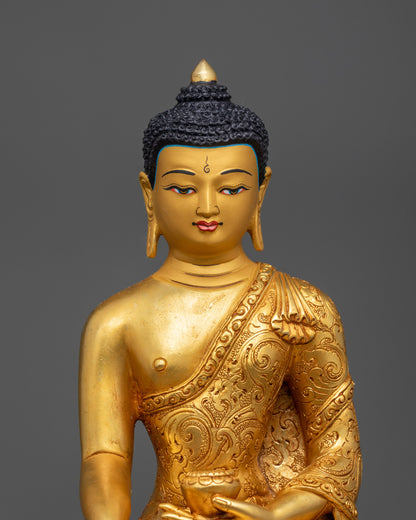 Close up of Buddha Statue showing intricate monk’s robe and detailed alms bowl