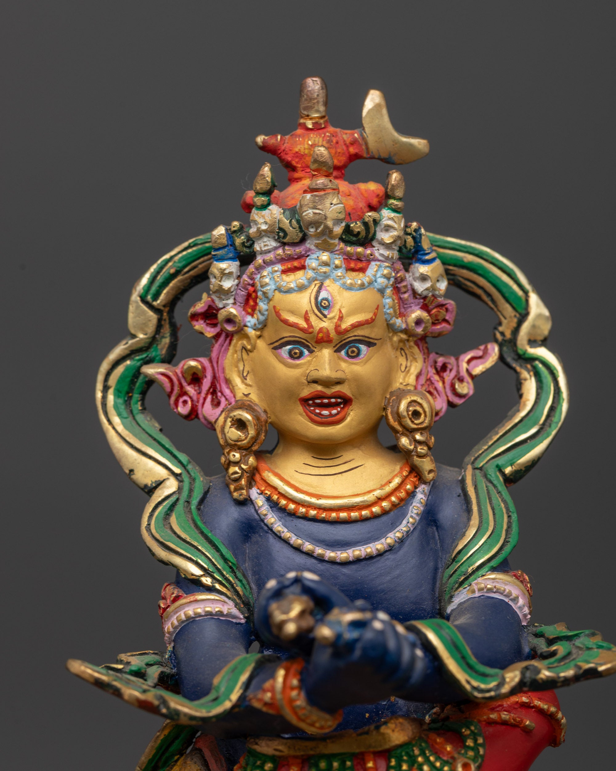 Close up of Chakrasamvara statue showing wrathful expression and detailed robes
