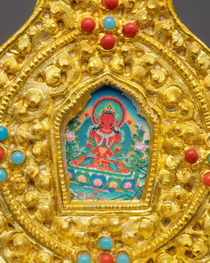 Close up of Che Bhumba lid with floral carvings and mini ghau box featuring Amitayus