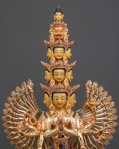 Close up of Chenrezig central hands holding wish-fulfilling jewel with peaceful face
