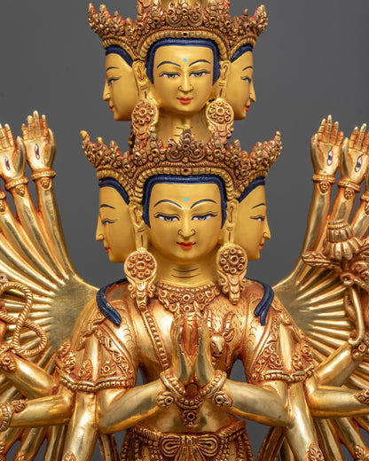 Close up of Chenrezig's central hands holding wish-fulfilling jewel and intricate arms