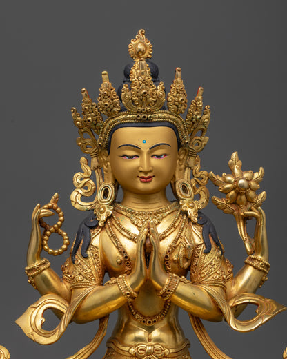 Close up of Chenrezig’s five-jeweled crown, jewelry, and intricate carved robe details

