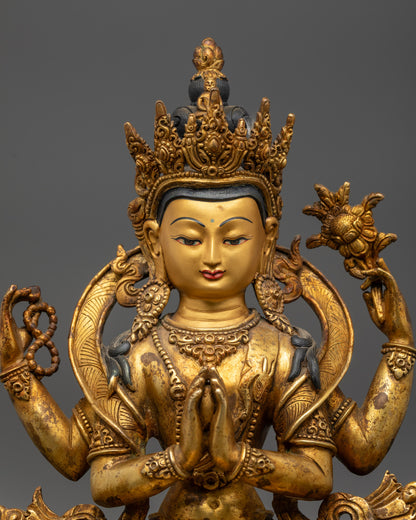 Close up of Chenrezig statue showing five-jeweled crowns and jewelry armlets
