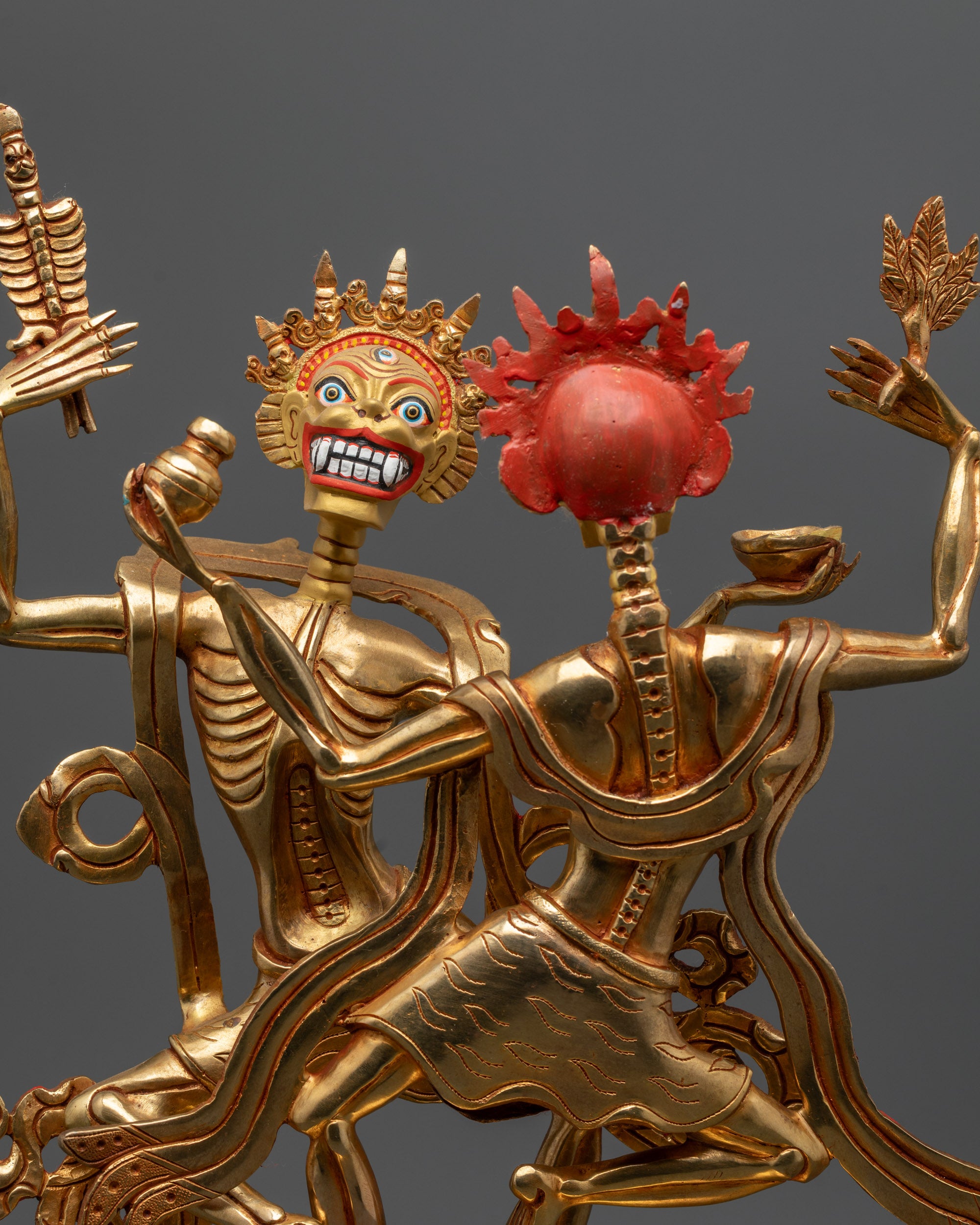 Close up of Chitipati Statue face with 24K gold-gilded features and Third Eye detail