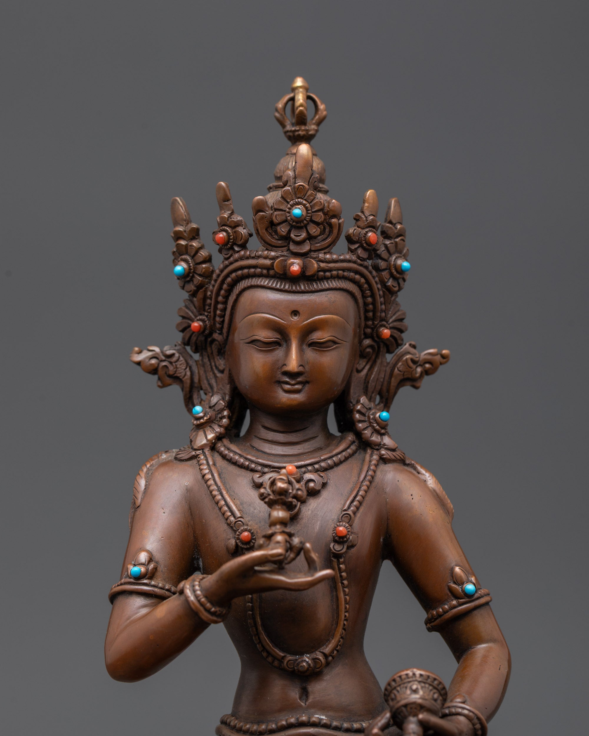 Close up of Dorje Sempa Statue showing Dorje, Bell, and detailed jewelry craftsmanship