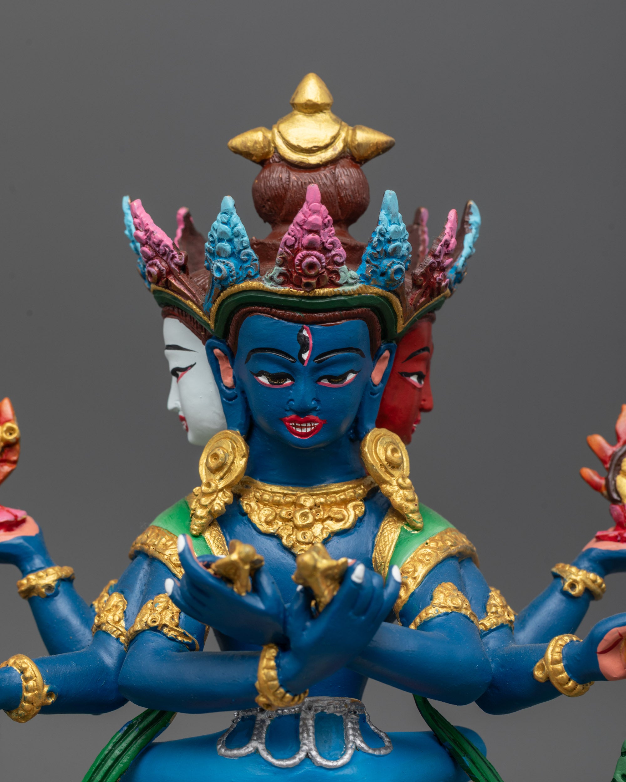 Close up of Guhyasamaja Consort Statue highlighting sacred objects and flowing robe details
