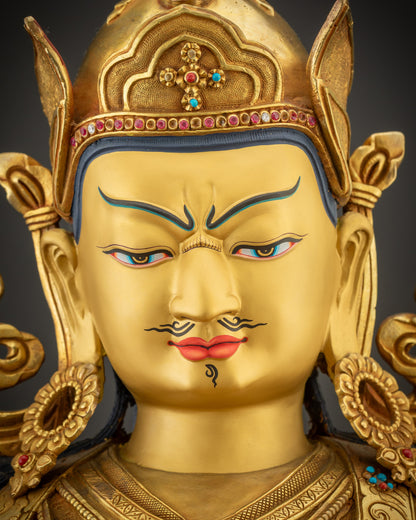Close up of Guru Rinpoche face showing serene yet wrathful expression

