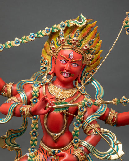 Close up of Kurukulla statue showing floral bow, arrows, and tantric ornaments