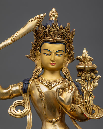 Close up of Manjushri Bodhisattva holding utpala flower and double-edged wisdom sword