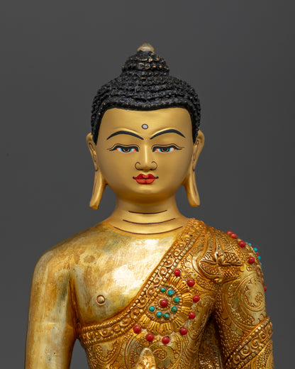 Close up of Medicine Buddha with healing bowl and lapis blue detailing