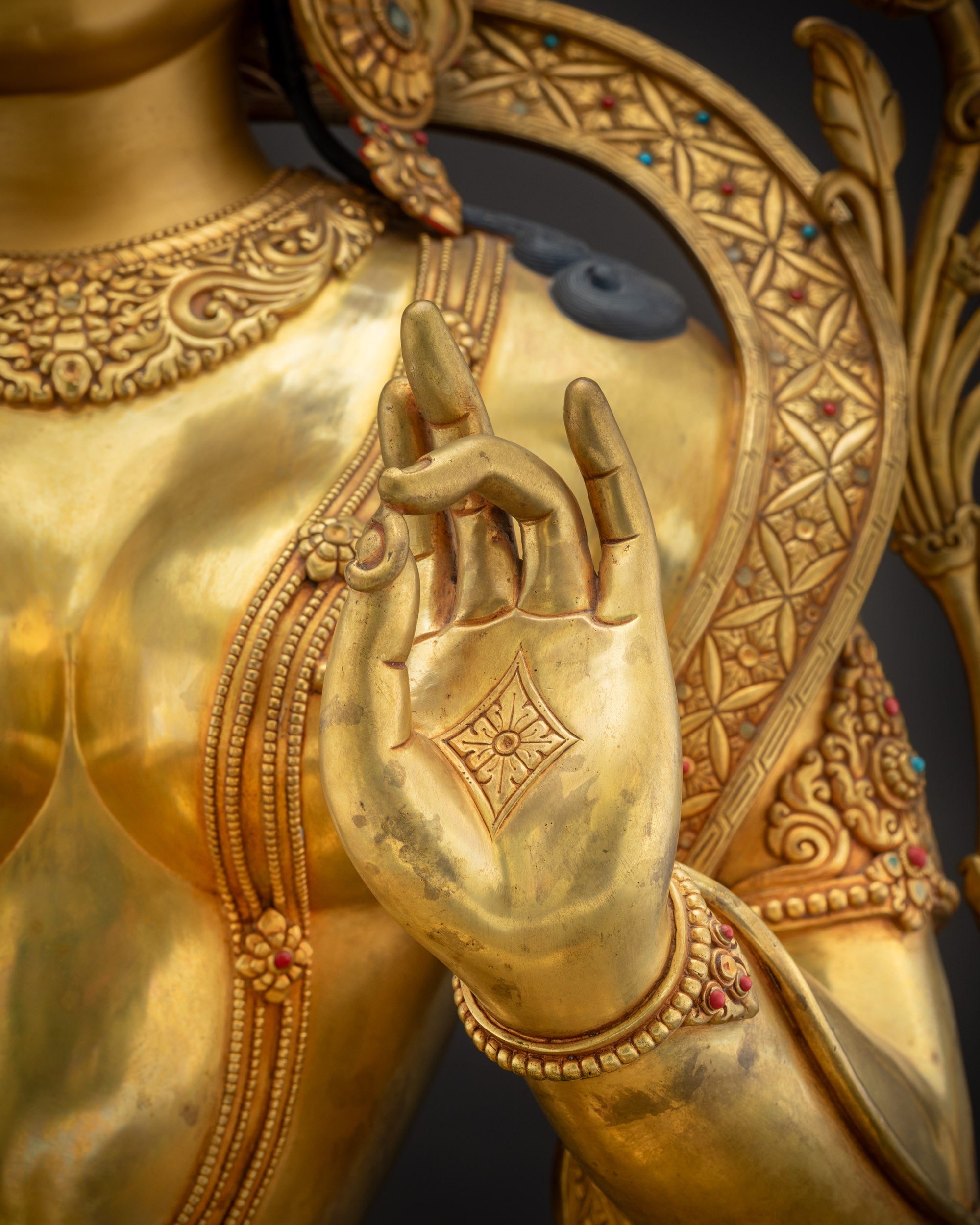 Close up of Mother statue Abhaya mudra left hand showing gesture