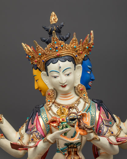 Close up of Namgyalma Statue showing intricate crown, jewelry, and sacred objects