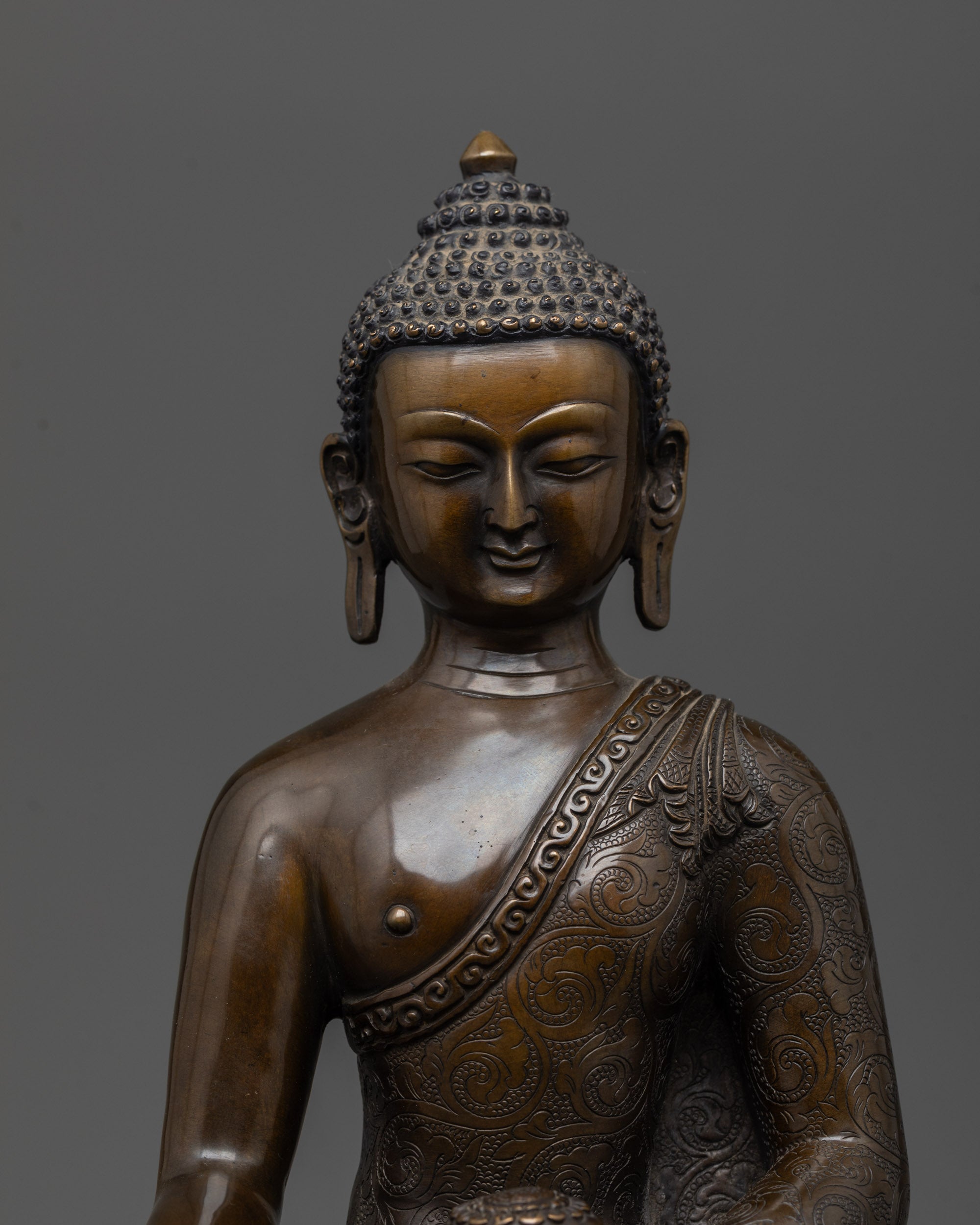Close up of Oxidized Gautama Buddha Statue highlighting earth-touching mudra and details