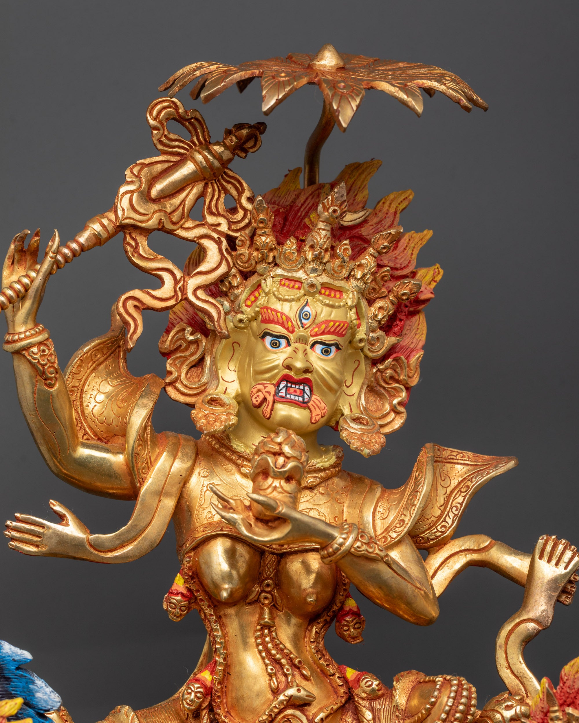 Close up of Palden Lhamo goddess showing skull crowns and intricate jewelry details