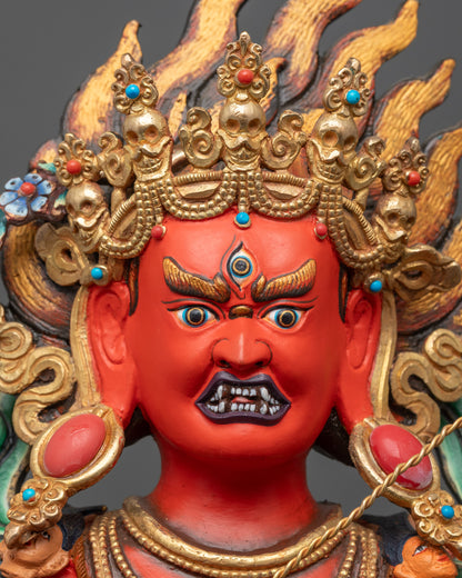 Close up of Red Kurukulla Dakini Face Sculpture showing five-skull crown and third eye details