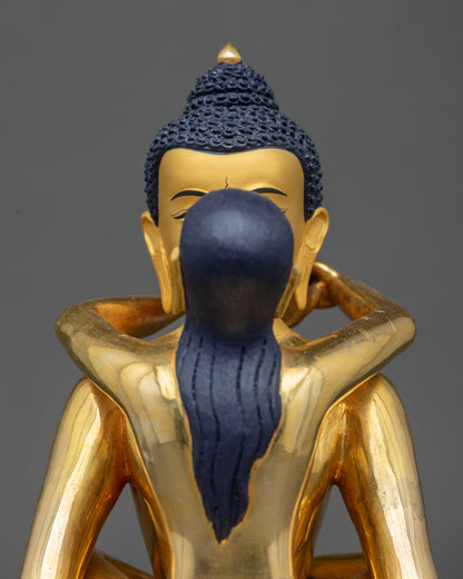 Close up of Samantabhadra Buddha Statue with gold-painted faces Nepal