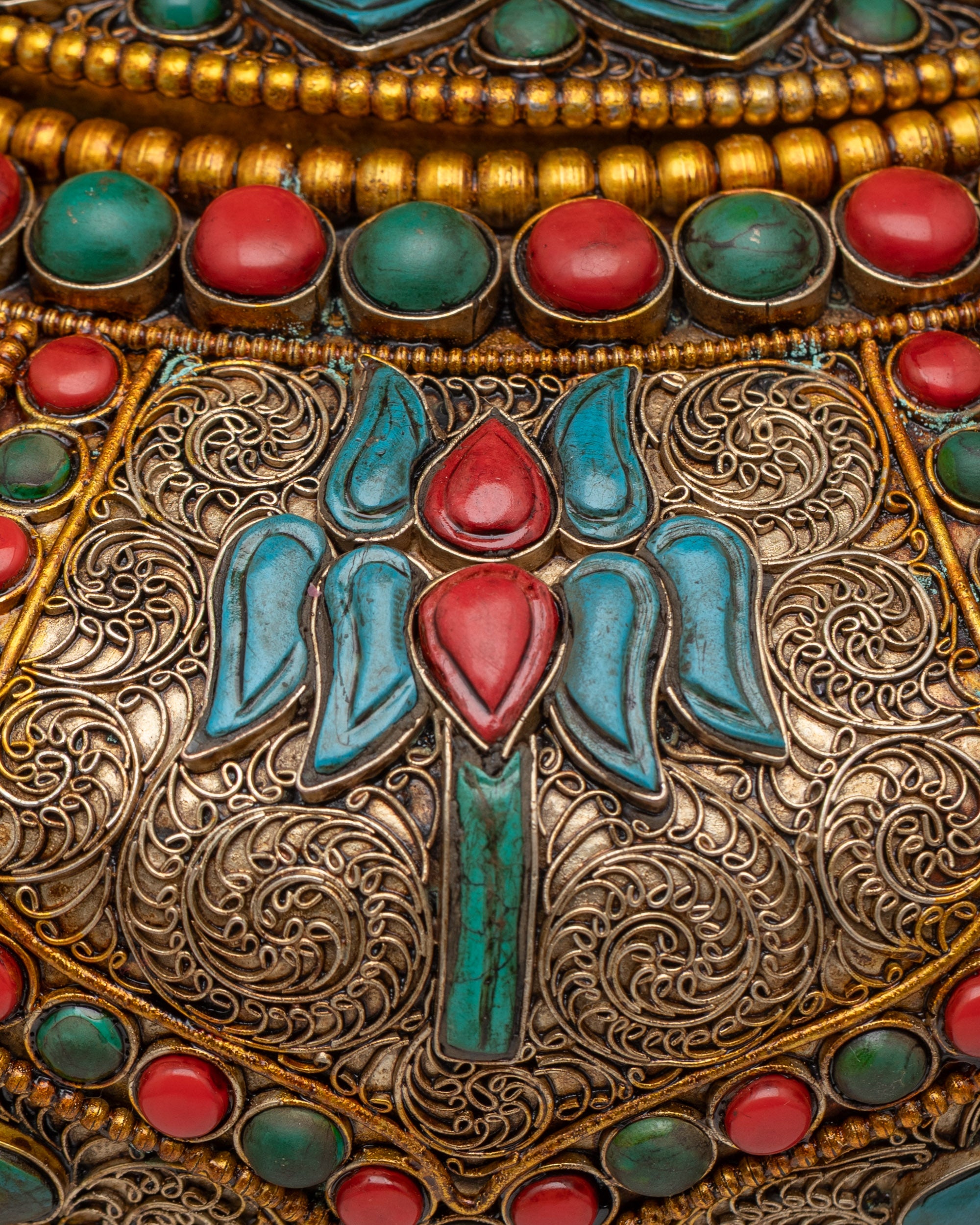 Close up of Tibetan Auspicious Rice Pot showing copper filigree and floral stone patterns
