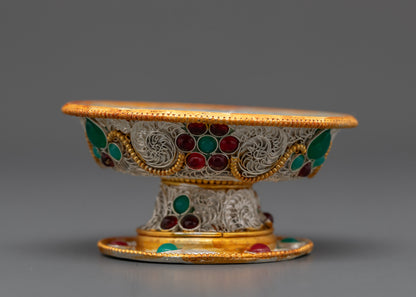 Close up of Tibetan Serkyem Offering Bowl showing intricate silver and gold filigree work