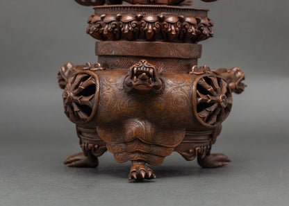Close up of Vajradhaka’s lifted head and open mouth with fangs, showing wrathful power