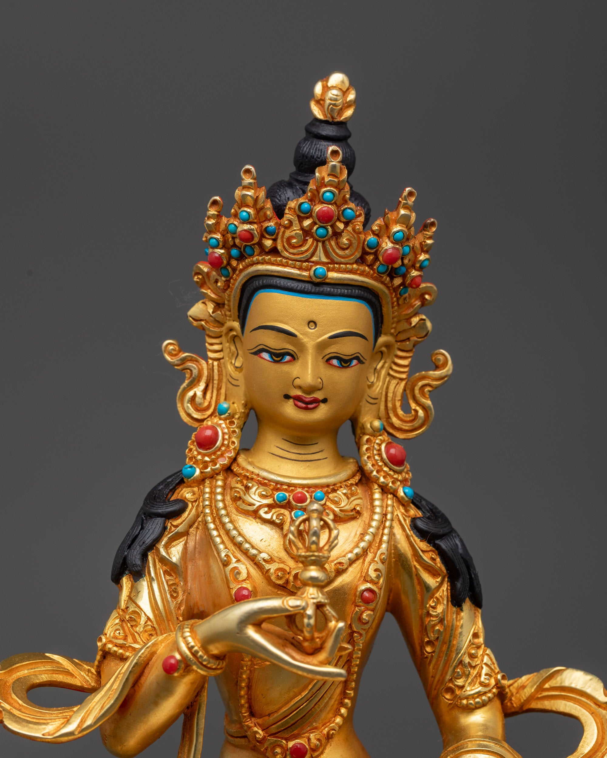 Close up of Vajrasattva Statue showing five-jeweled crown and semi-precious stones