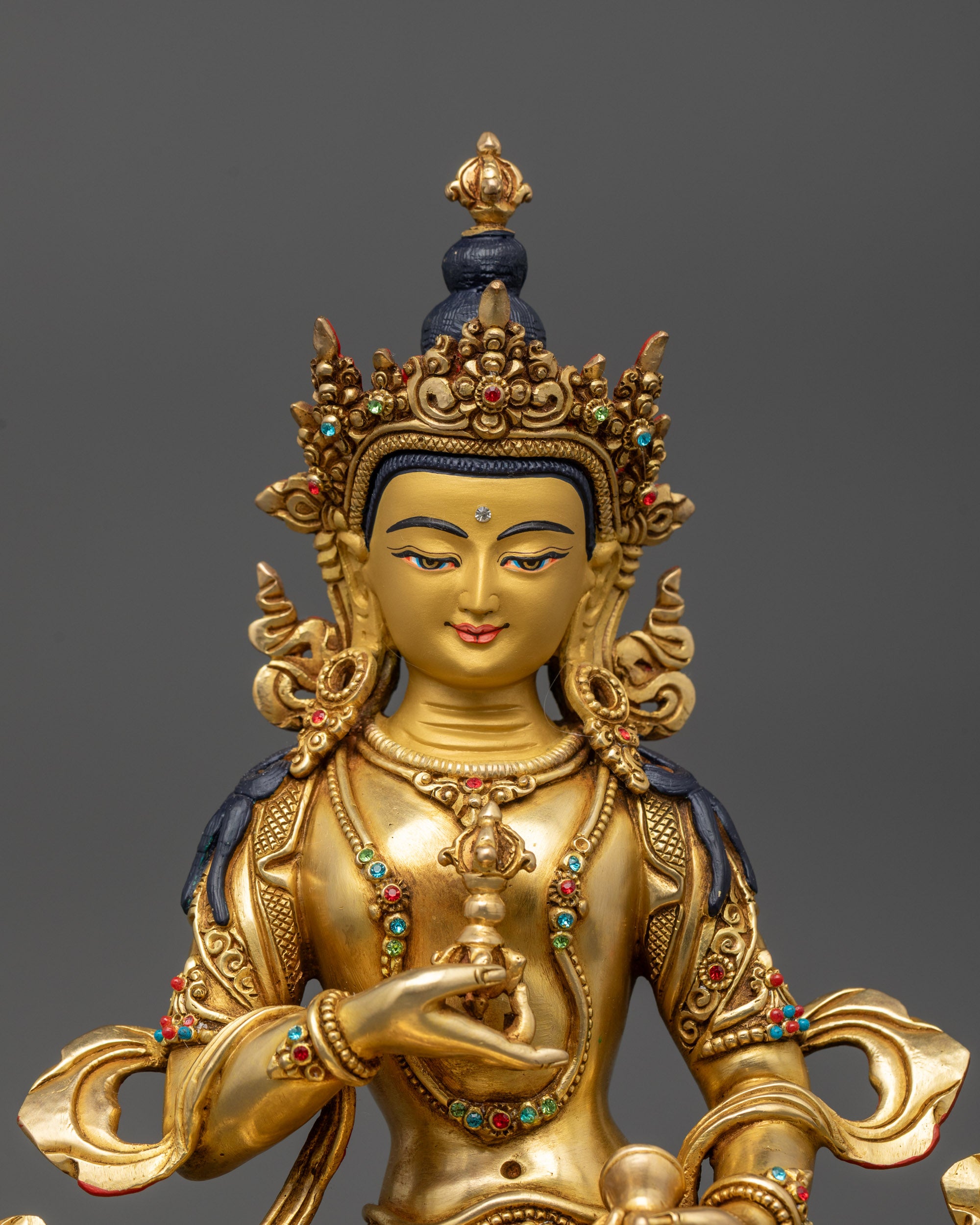 Close up of Vajrasattva face with Five-Jeweled Crown and serene expression