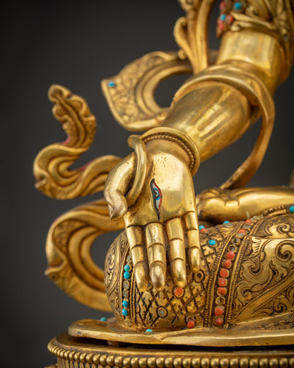 Close up of Varada mudra White Tara statue right hand generosity blessing pose
