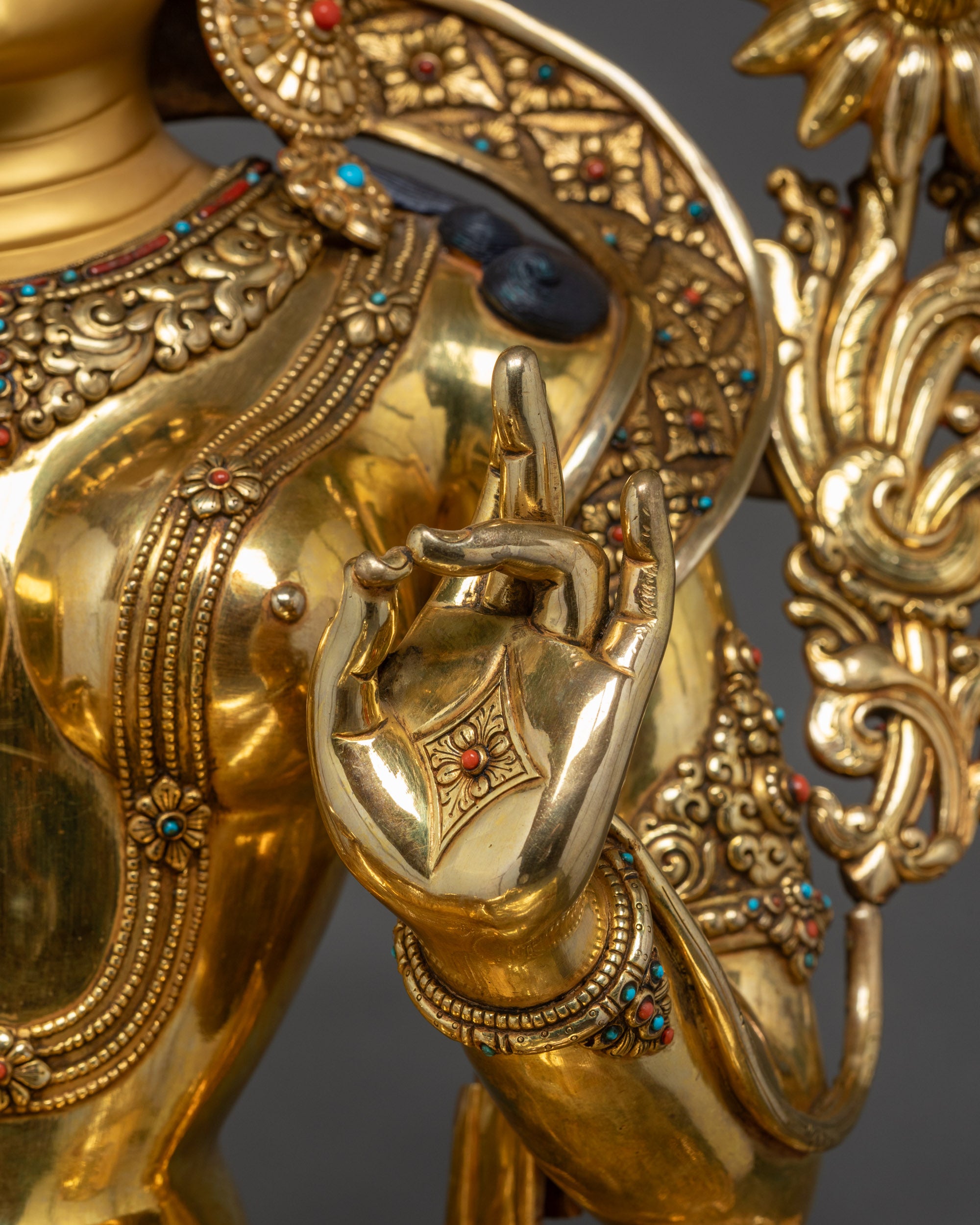 Close up of abhaya mudra left hand of Nepalese Green Tara Statue
