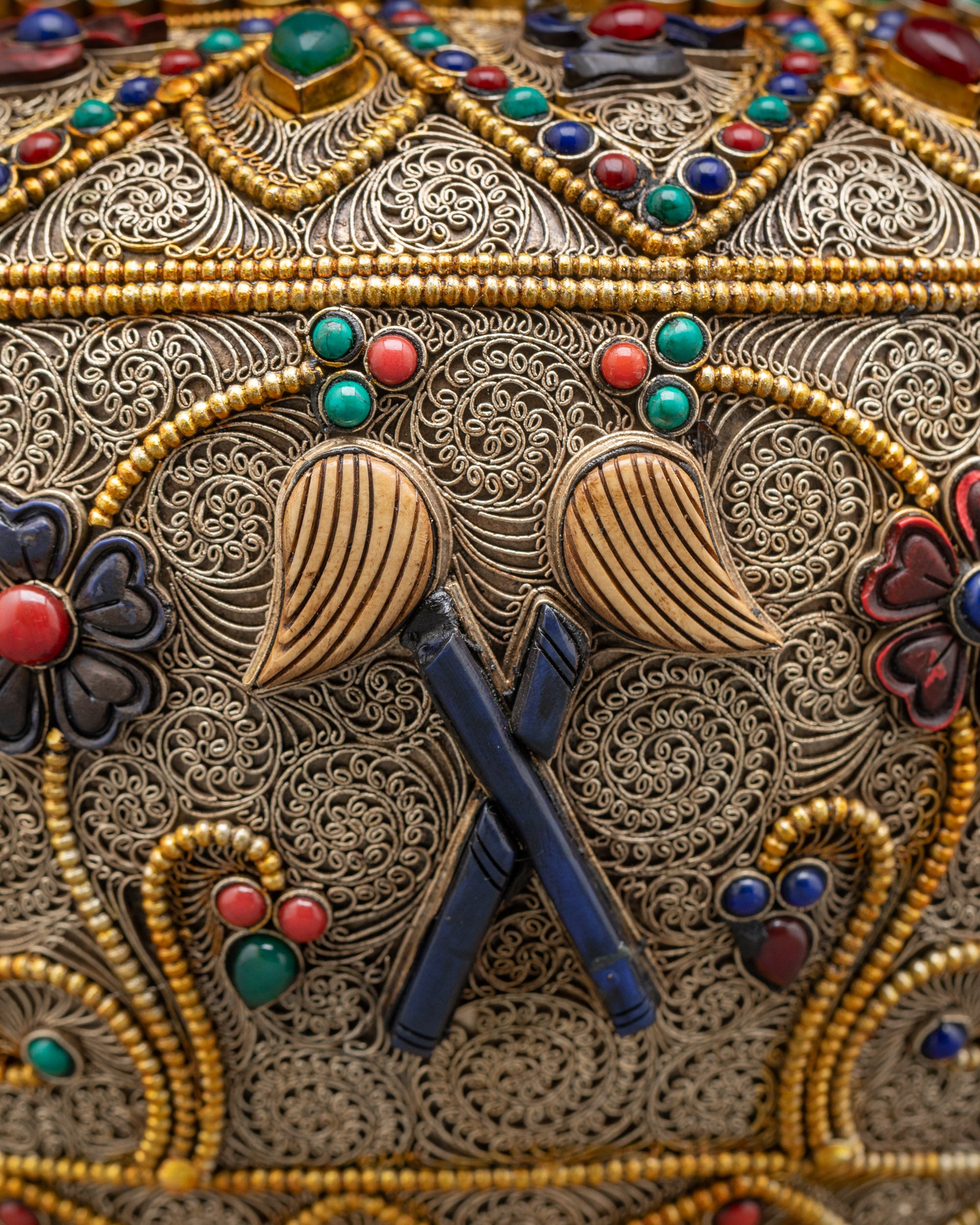 Close up of copper & gold-plated Tibetan Rice Pot adorned with coral, turquoise, lapis