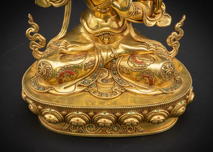 Close up of flower motifs on lower garments of Masterpiece Manjushri Statue