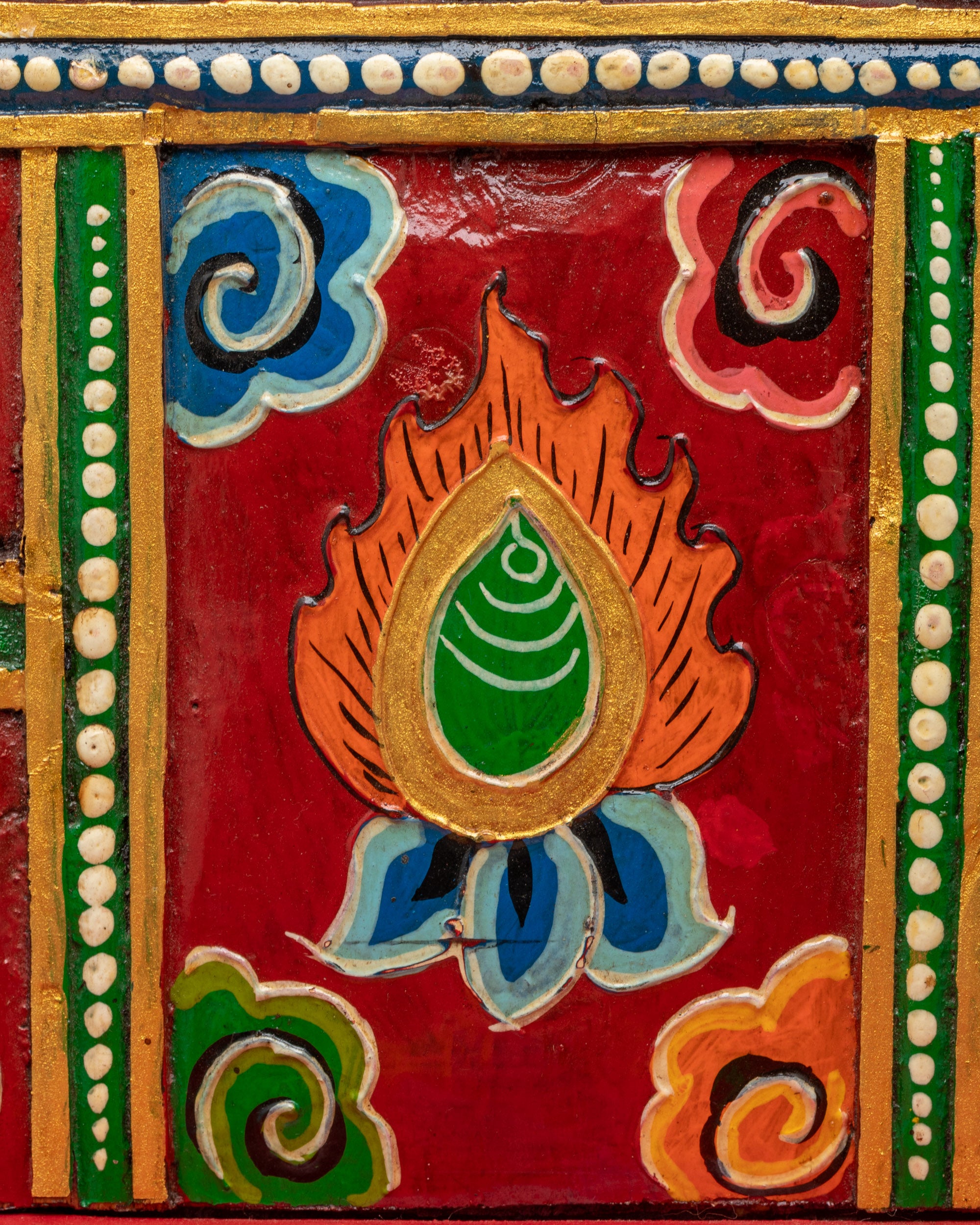 Close up of hand-carved wood and premium acrylic colors on Nepalese Buddhist Throne