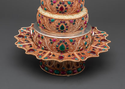 Close up of intricate filigree and semi-precious stones on Tibetan Ratna Mandala