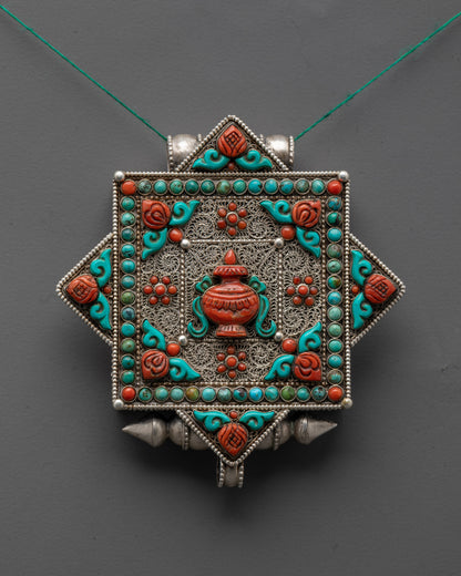 Close up of intricate silver-plated filigree design on Tibetan Treasure Vase Locket pendant
