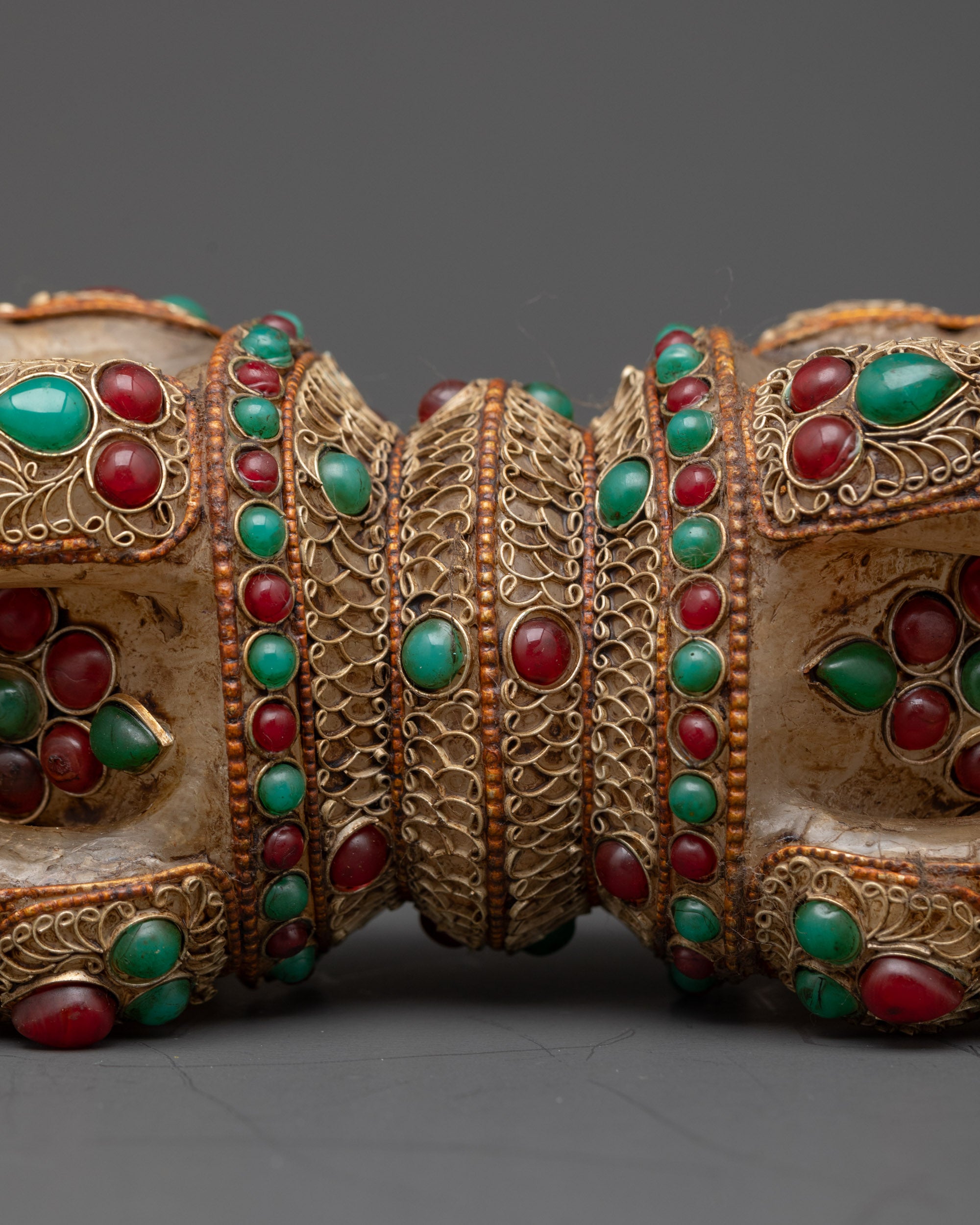 Close up of ornate copper filigree on Nepalese handcrafted Dorje Vajra