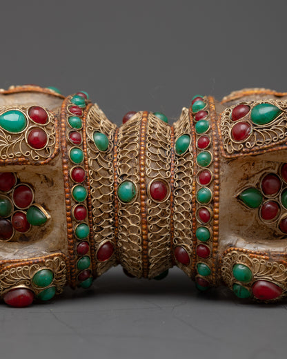 Close up of ornate copper filigree on Nepalese handcrafted Dorje Vajra