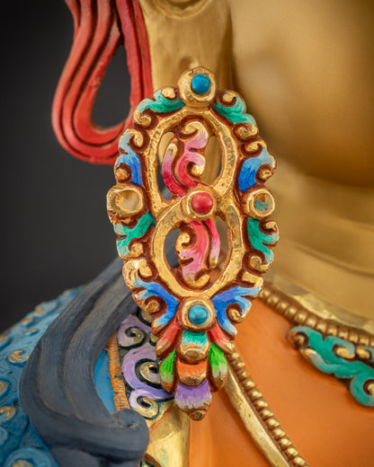 Close up of right side of Manjushri statue Earrings showing floral motifs and texture
