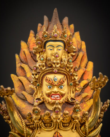 Close up of upper faces with buffalo head, third eye, skull diadem, and detailed gold-painted expressions
