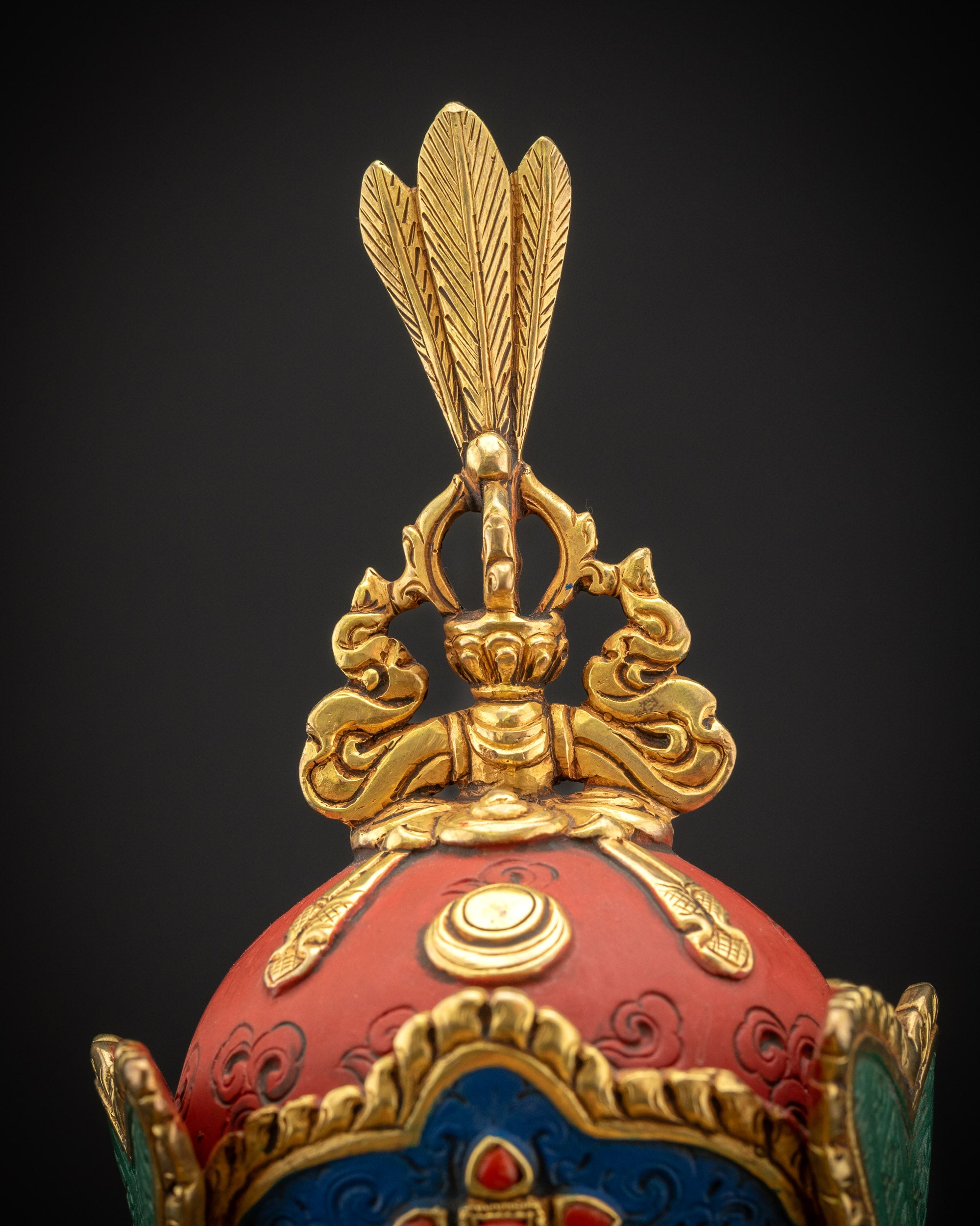Close up of vulture feather on Guru Rinpoche lotus hat